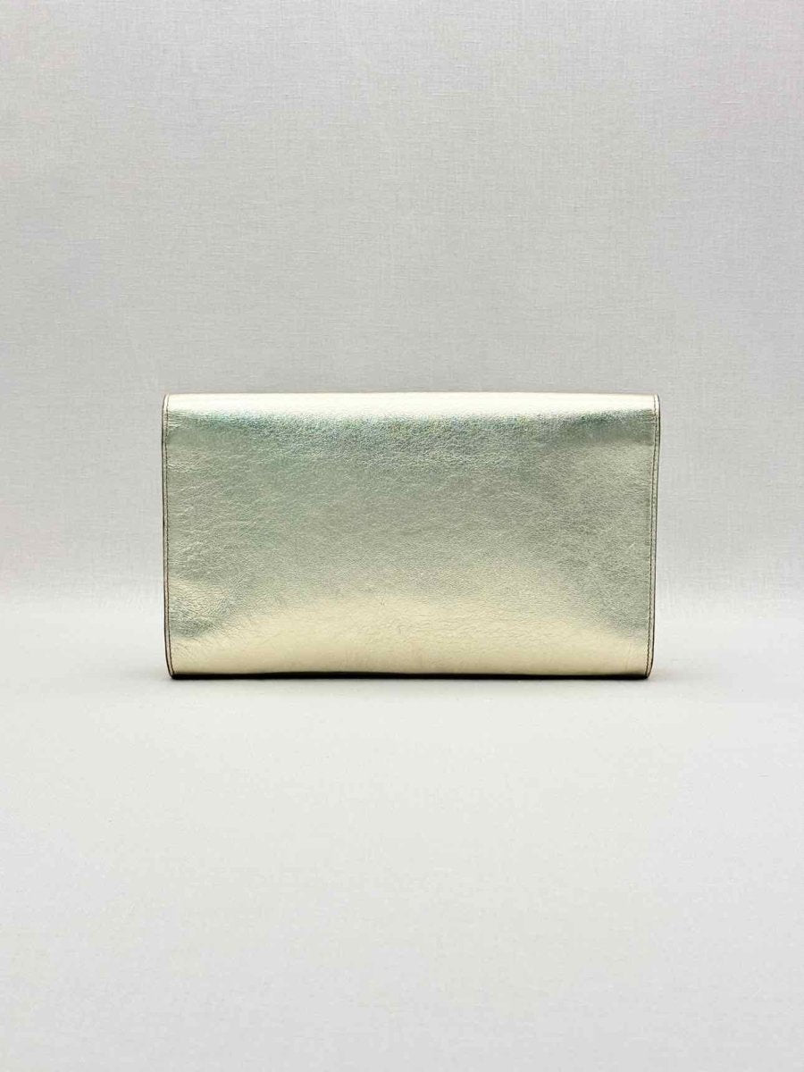 Pre-loved YVES SAINT LAURENT Belle De Jour Metallic Gold Clutch at Reems Closet