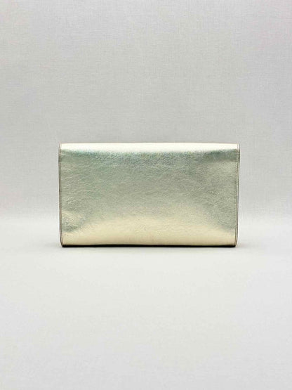 Pre-loved YVES SAINT LAURENT Belle De Jour Metallic Gold Clutch at Reems Closet