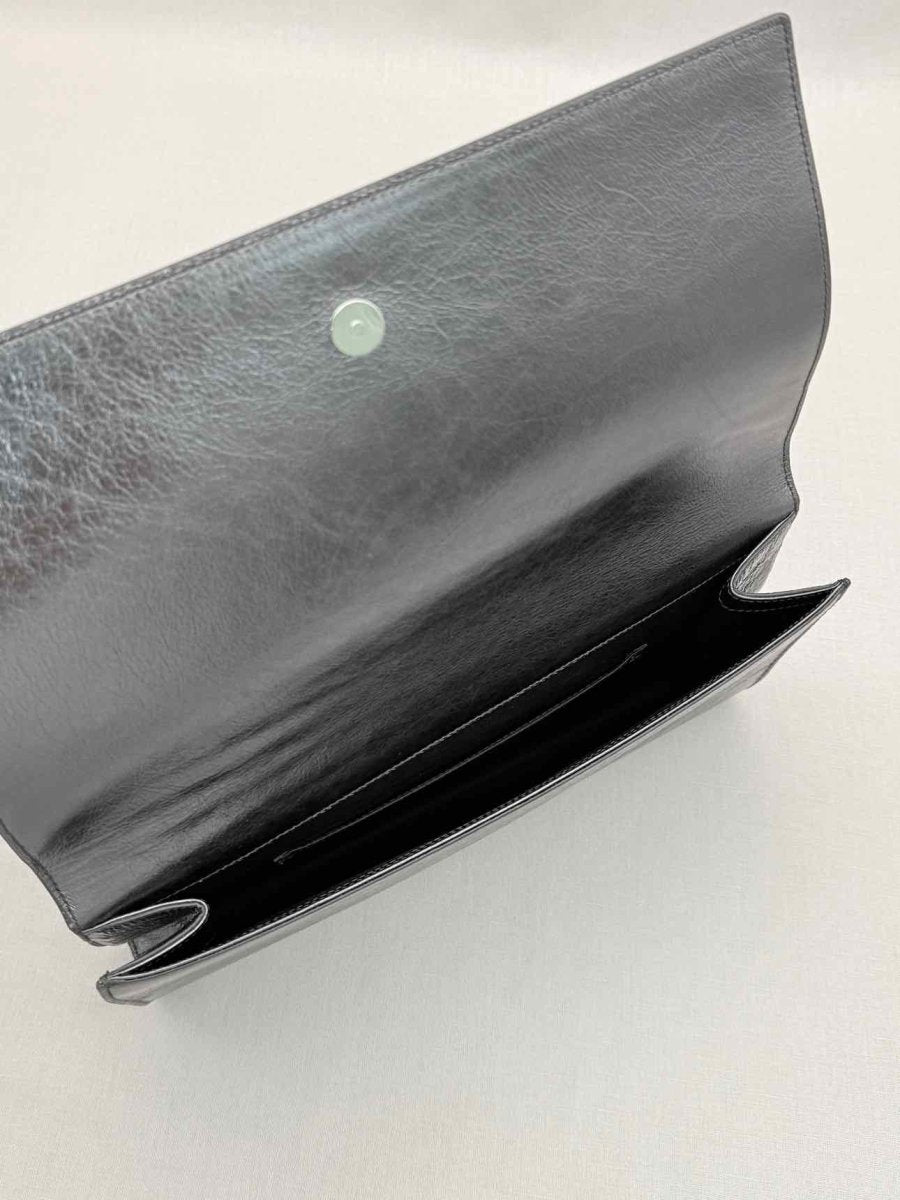 Pre-loved YVES SAINT LAURENT Belle De Jour Metallic Grey Clutch at Reems Closet