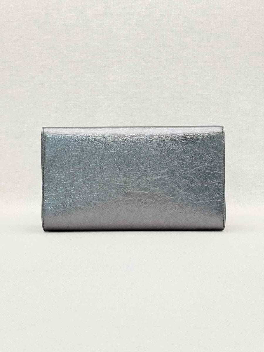 Pre-loved YVES SAINT LAURENT Belle De Jour Metallic Grey Clutch at Reems Closet