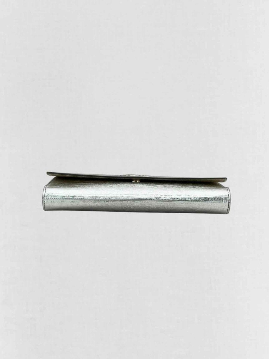 Pre - loved YVES SAINT LAURENT Belle De Jour Metallic Silver Clutch at Reems Closet