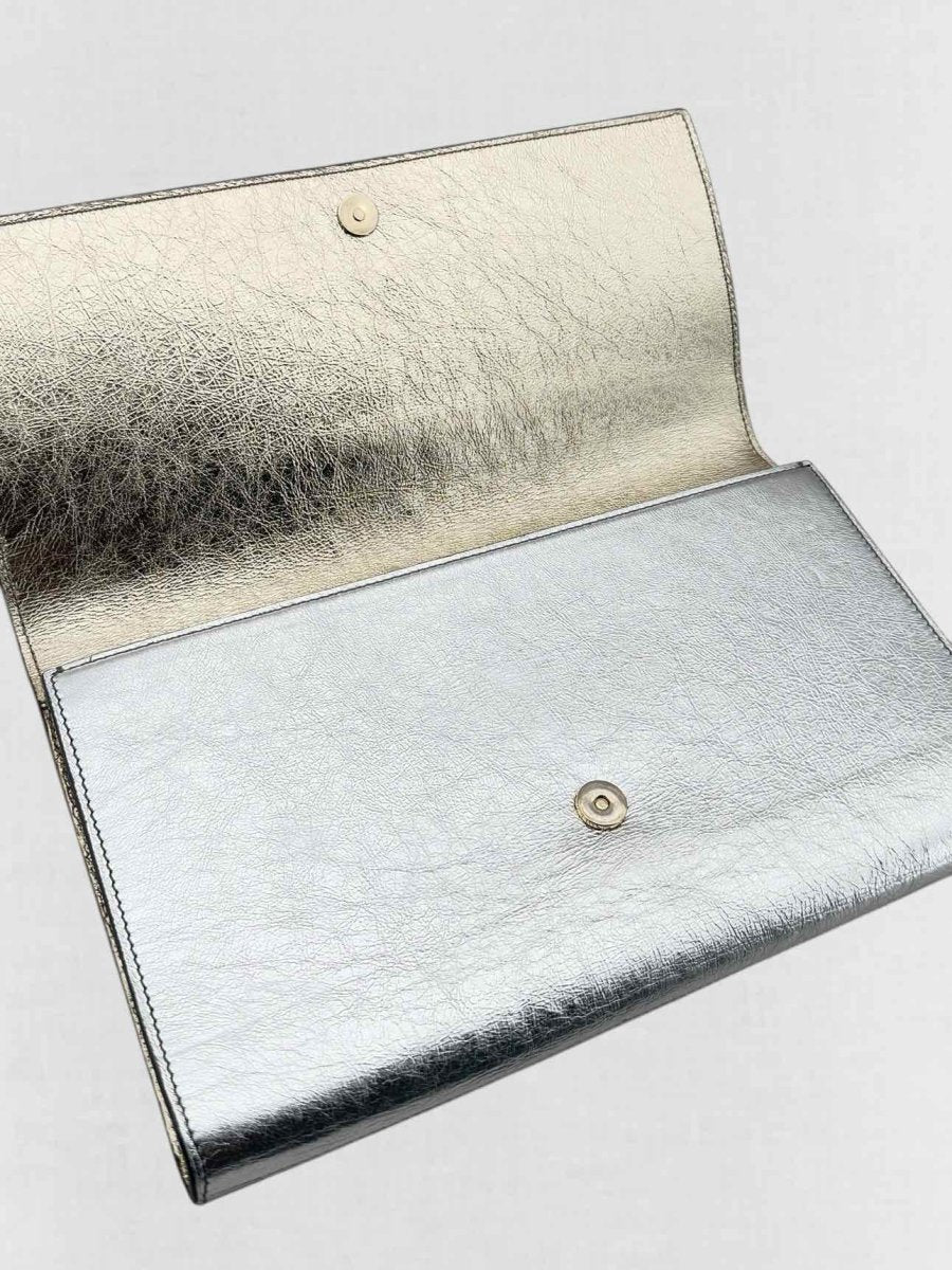 Pre - loved YVES SAINT LAURENT Belle De Jour Metallic Silver Clutch at Reems Closet