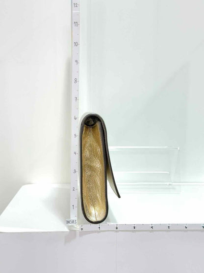 Pre - loved YVES SAINT LAURENT Belle De Jour Metallic Silver Clutch at Reems Closet