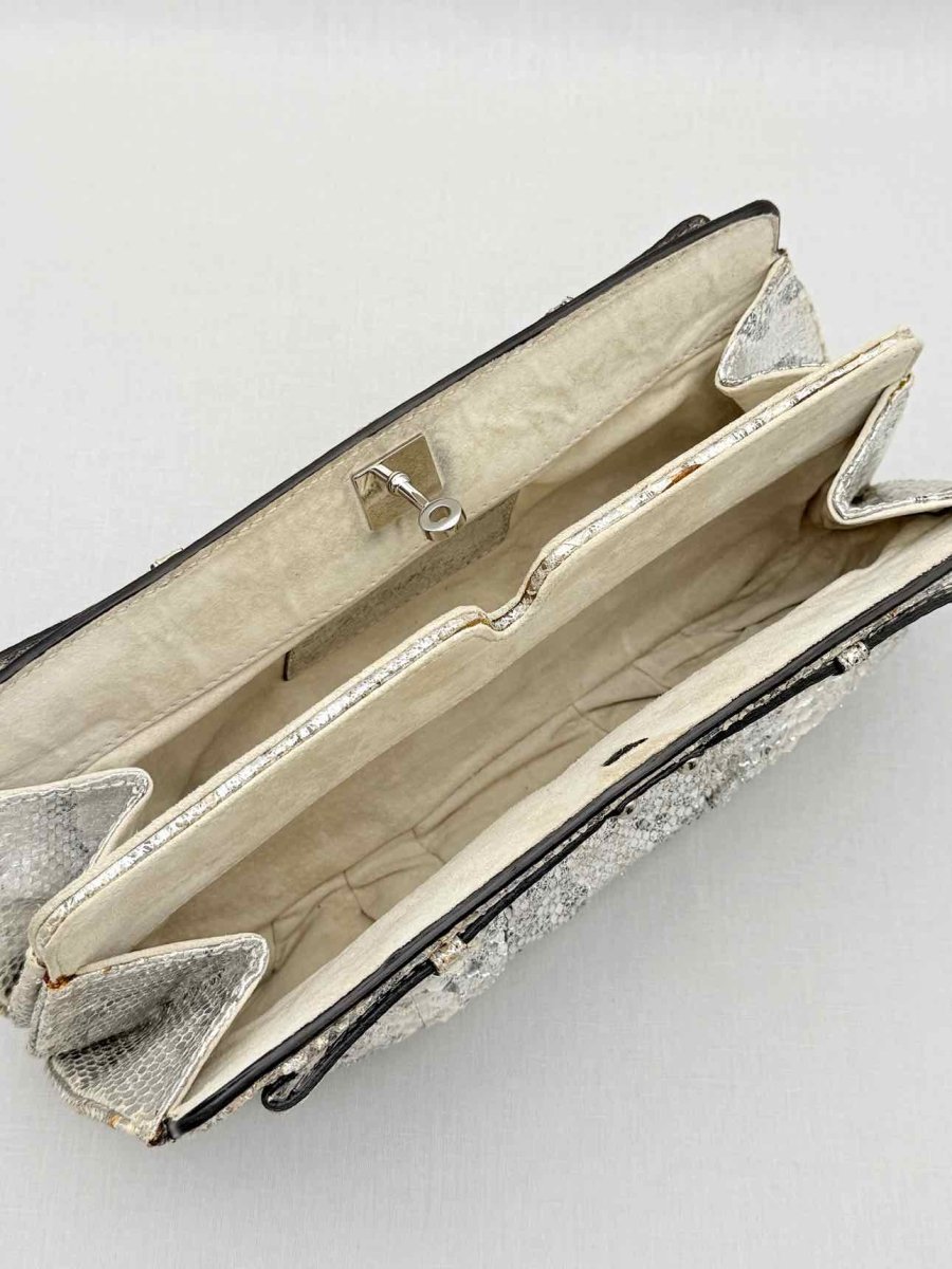 Pre - loved ZAGLIANI Metallic Silver Clutch at Reems Closet