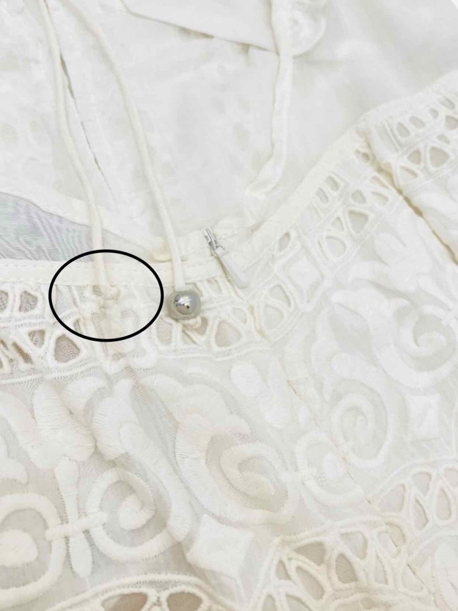Pre-loved ZIMMERMANN White Size Small Playsuit at Reems Closet