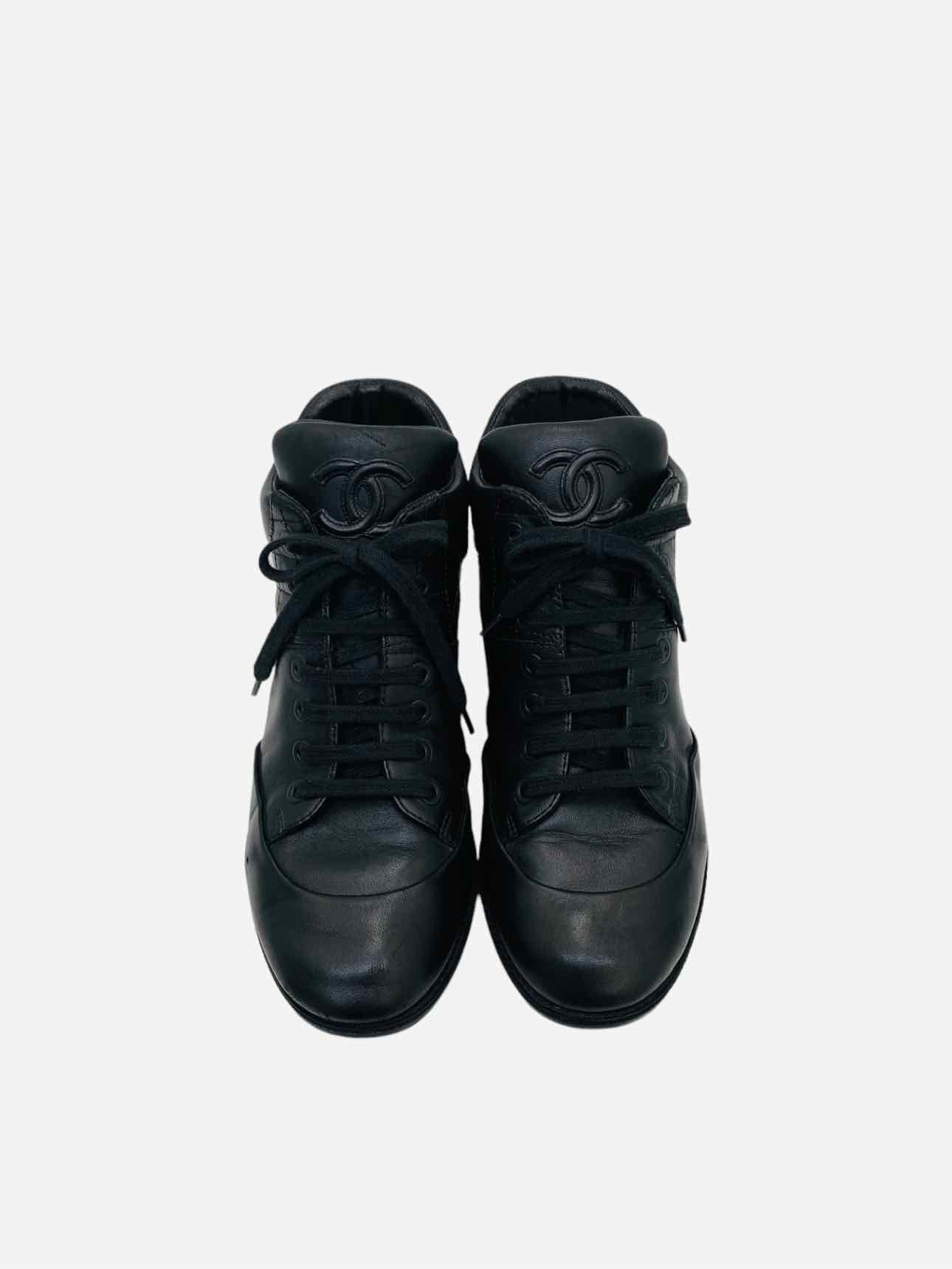 Pre - loved CHANEL High Top Black Quilted Sneakers at Reems Closet