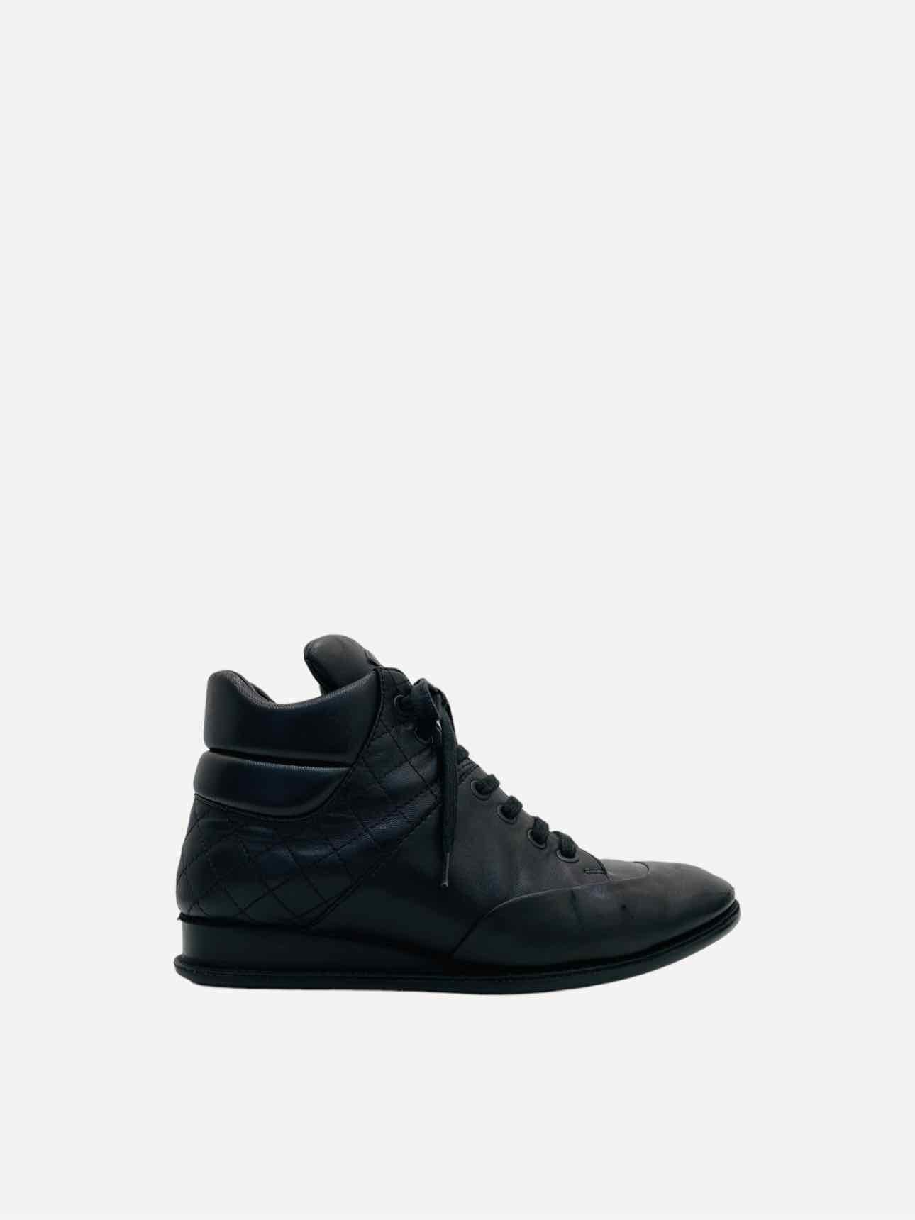 Pre - loved CHANEL High Top Black Quilted Sneakers at Reems Closet