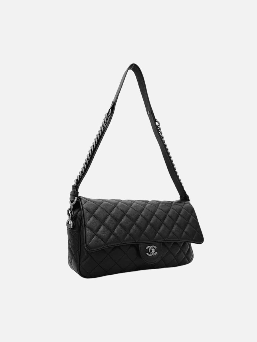 Pre-loved CHANEL Casual Rock Flap Black Quilted Shoulder Bag from Reems Closet
