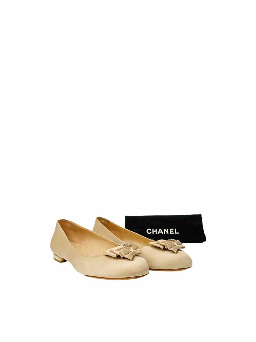 Pre-loved CHANEL Gold Bow Flats - Reems Closet