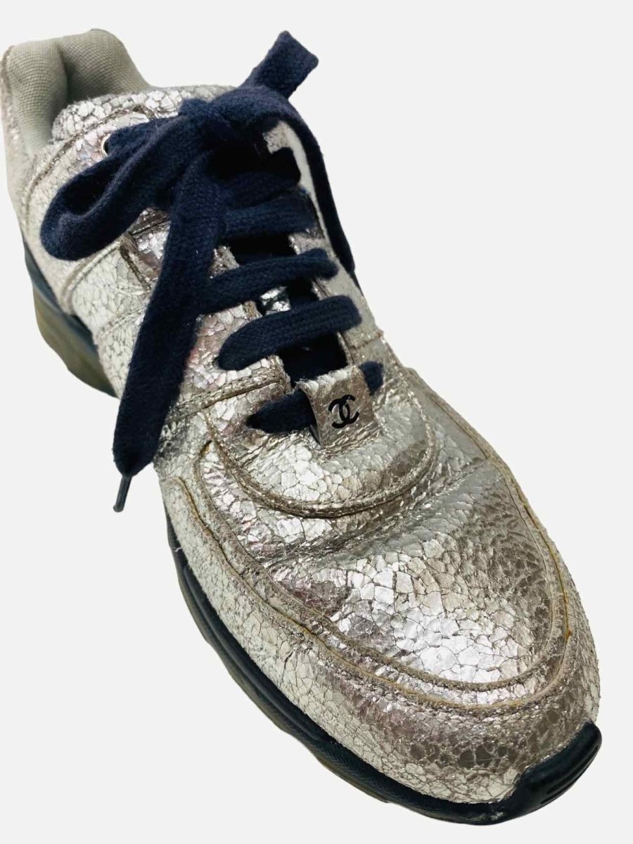 Pre-loved CHANEL Low Top Silver Cracked Sneakers from Reems Closet