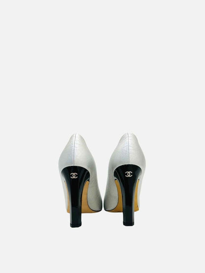 Pre-loved CHANEL Metallic Silver & Black Cap Toe Pumps from Reems Closet