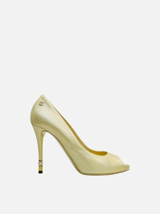 Pre-loved CHANEL Peep Toe Cream Pumps from Reems Closet