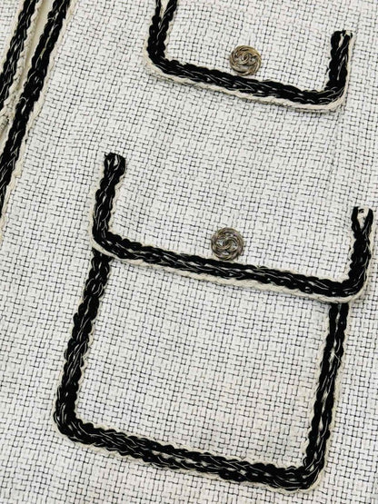 Pre-loved CHANEL White & Black Tweed Gilet from Reems Closet