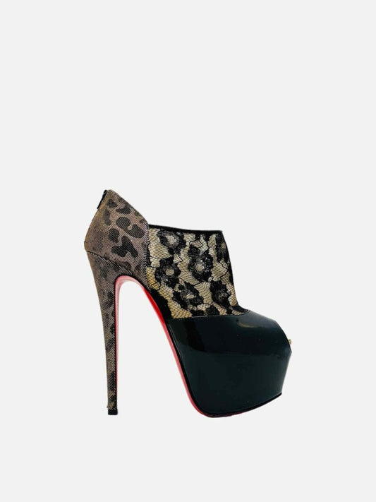 Pre-loved CHRISTIAN LOUBOUTIN Aeronotoc Black Booties from Reems Closet