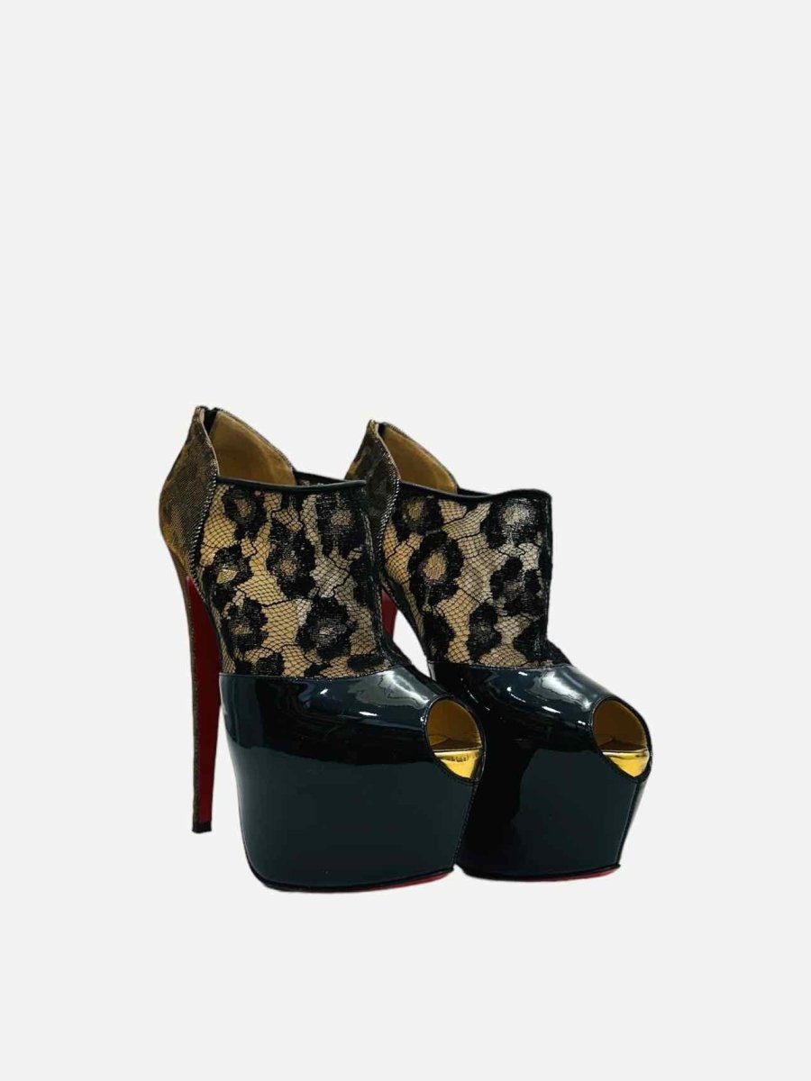 Pre-loved CHRISTIAN LOUBOUTIN Aeronotoc Black Booties from Reems Closet