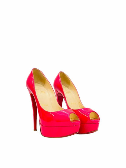 Pre-loved CHRISTIAN LOUBOUTIN Fuchsia Open Toe Pumps from Reems Closet