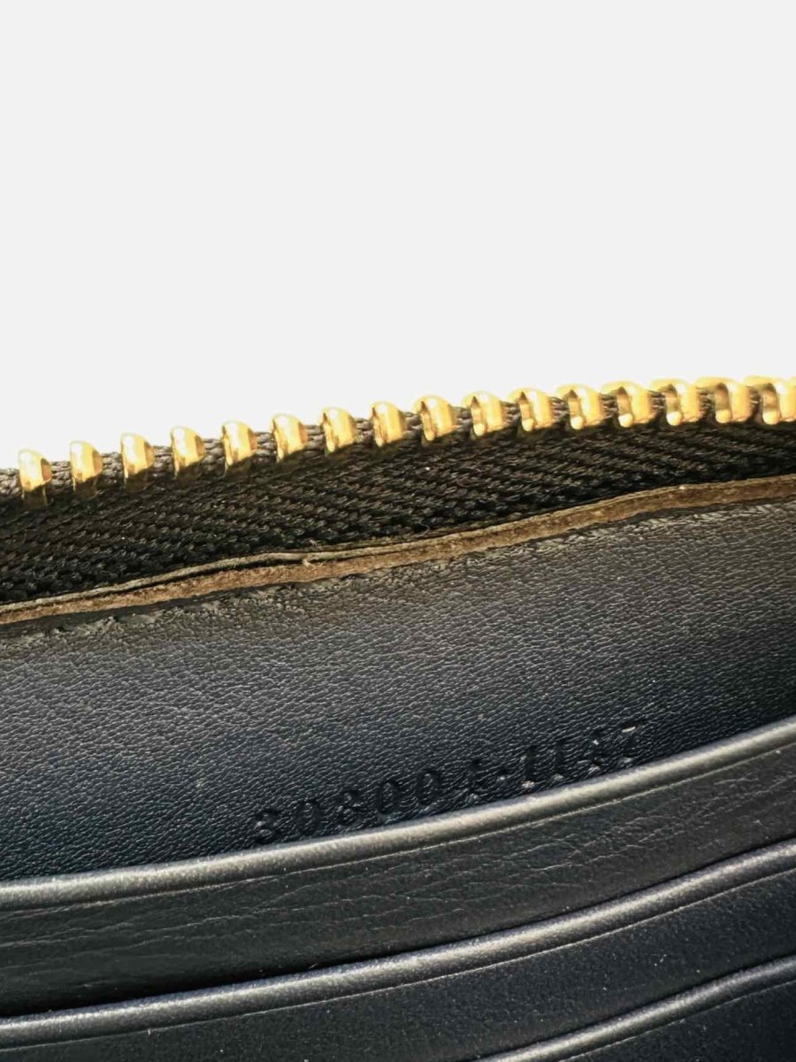 Pre-loved GUCCI Zip Around Black & Brown Continental Wallet from Reems Closet