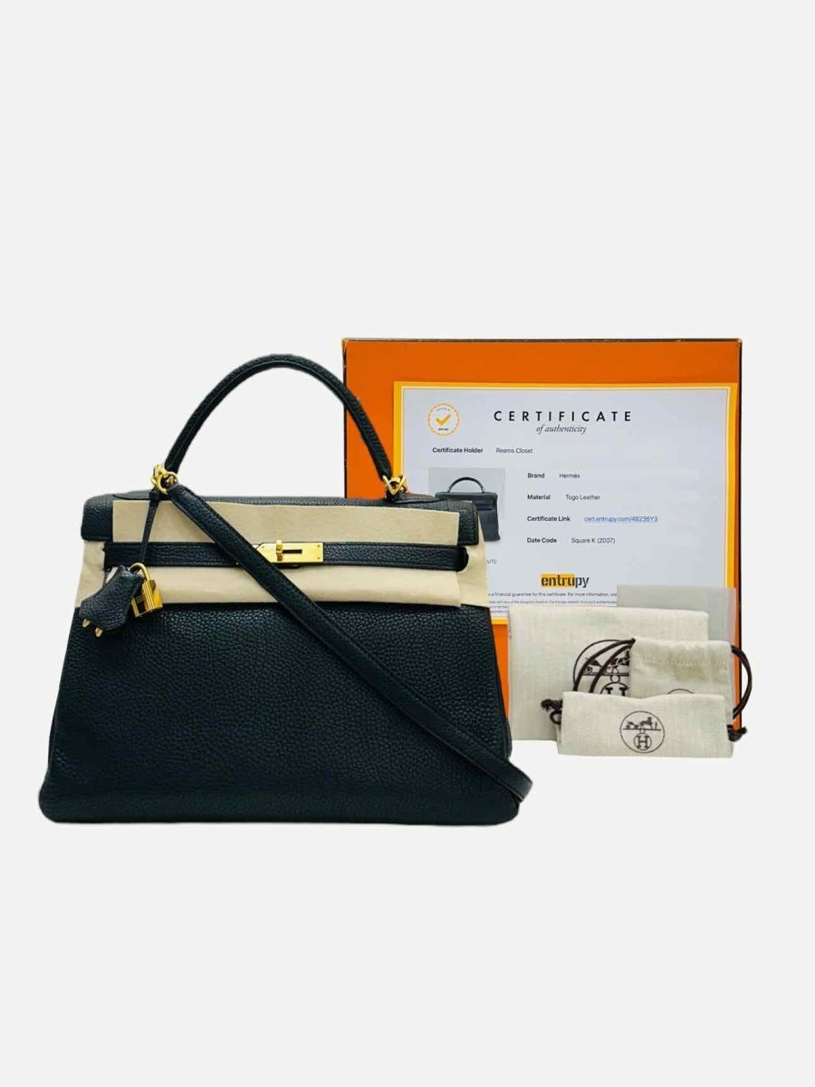 Pre - loved HERMES Kelly Black Top Handle at Reems Closet