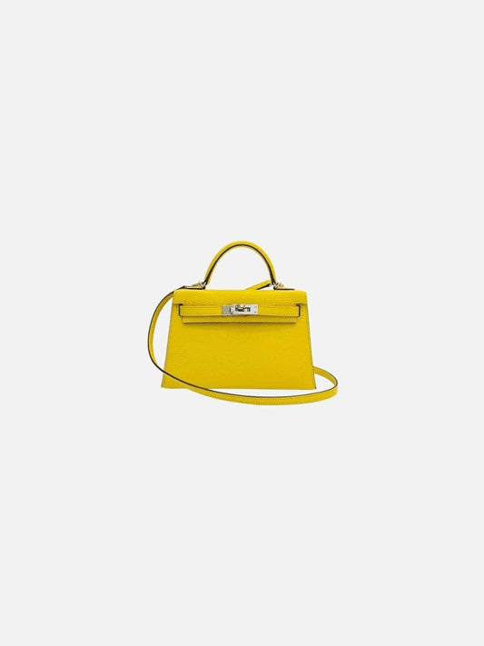 Pre-loved HERMES Kelly Yellow Two tone Top Handle from Reems Closet