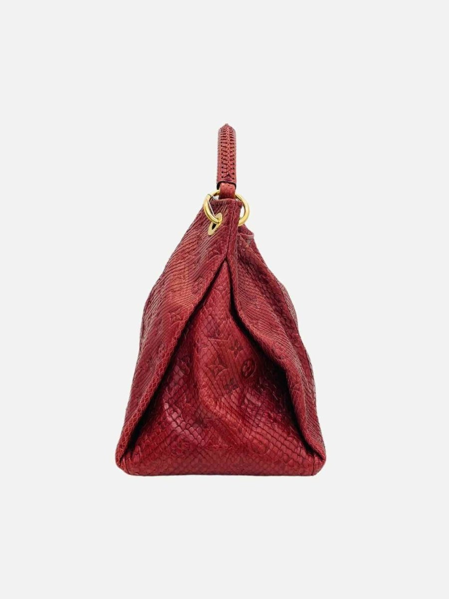Pre-loved LOUIS VUITTON Artsy Red Monogram Embossed Shoulder Bag from Reems Closet