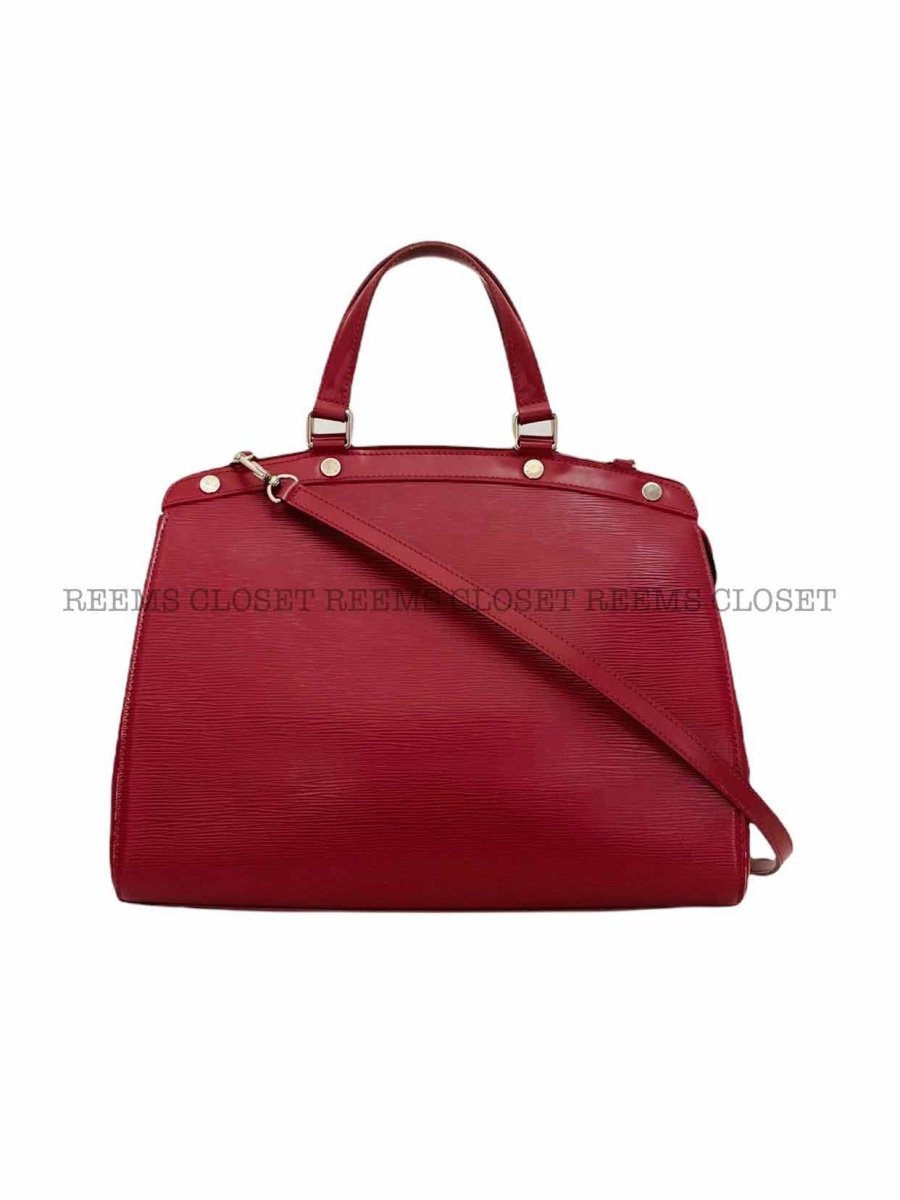 Pre - loved LOUIS VUITTON Brea Red Top Handle at Reems Closet