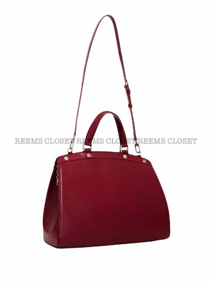 Pre - loved LOUIS VUITTON Brea Red Top Handle at Reems Closet