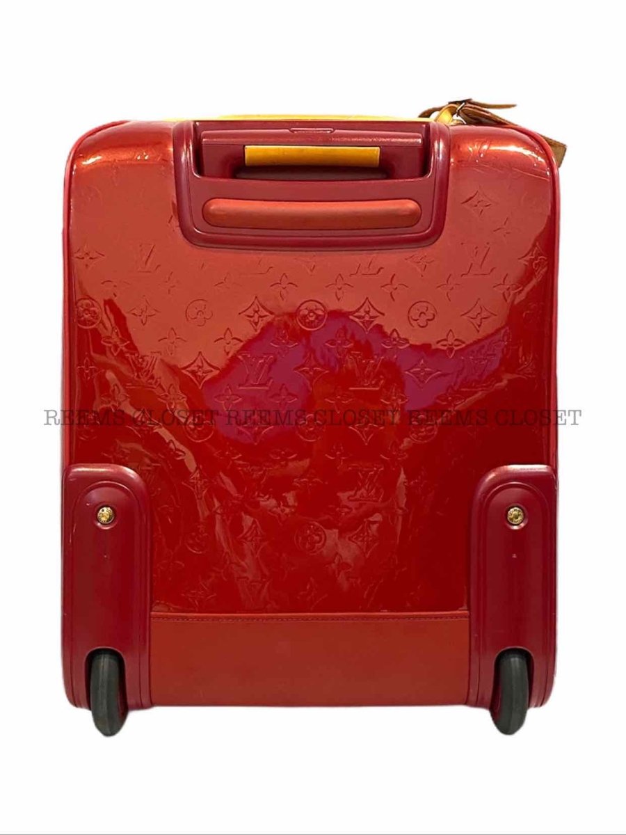 Pre-loved LOUIS VUITTON Red Rolling Luggage - Reems Closet