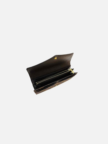 Pre-loved LOUIS VUITTON Sarah Brown Continental Wallet from Reems Closet