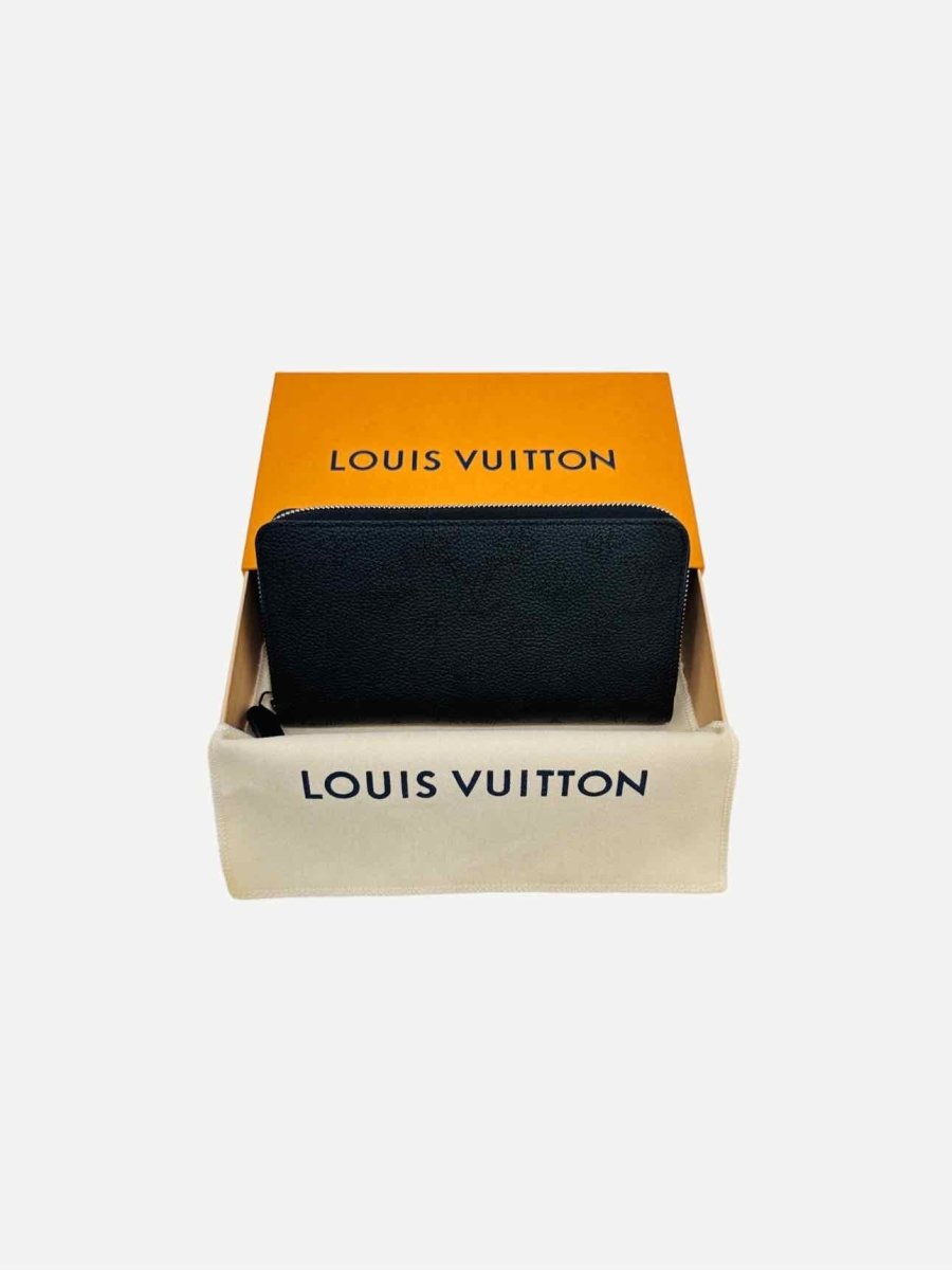 Pre-loved LOUIS VUITTON Zippy Noir Monogram Continental Wallet from Reems Closet