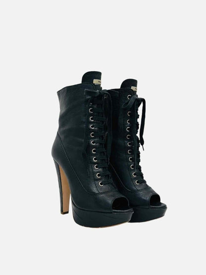Pre-loved MIU MIU Lace Up Black Ankle Boots from Reems Closet