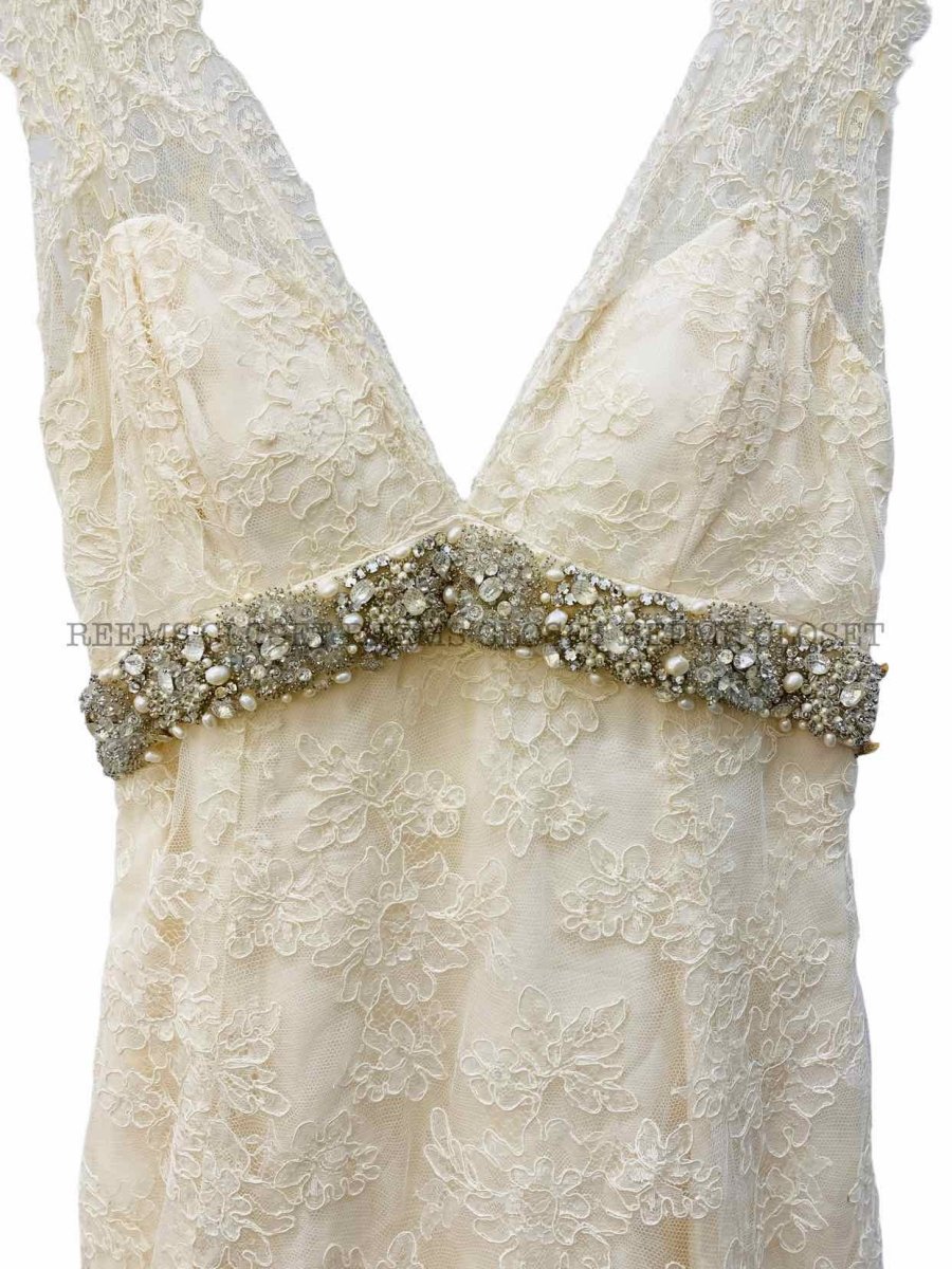 Pre-loved MONIQUE LHUILLIER Vintage Beige Wedding Gown from Reems Closet